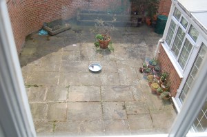 The courtyard as seen from the bedroom upstairs