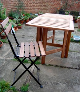 The table with one of the 4 chairs that we got as well.  I didn't want to get them all out as it looked as though it was about to rain.
