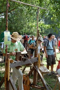 Turning a leg for a stool with a foot powered turning device.