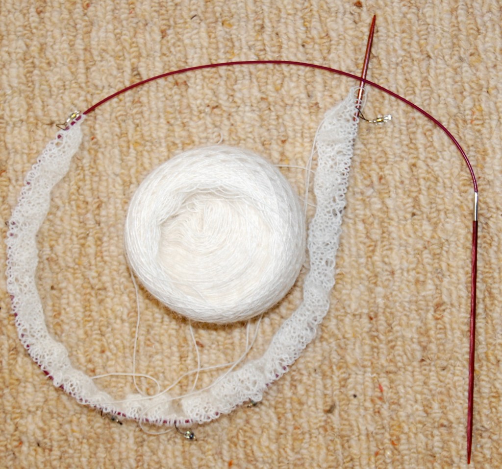 For all of my non-knitting readers, it isn't beaded, those are stitch markers.