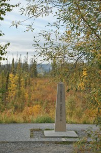 You can see the line of cleared forest where the actual border is.