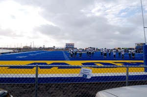 The football field is made entirely of astroturf and it is probably 20 yards from the Arctic Sea.  When the Barrow Whalers win a game the entire team take a dip in the water!